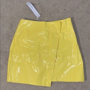 Yellow leather mini skirt